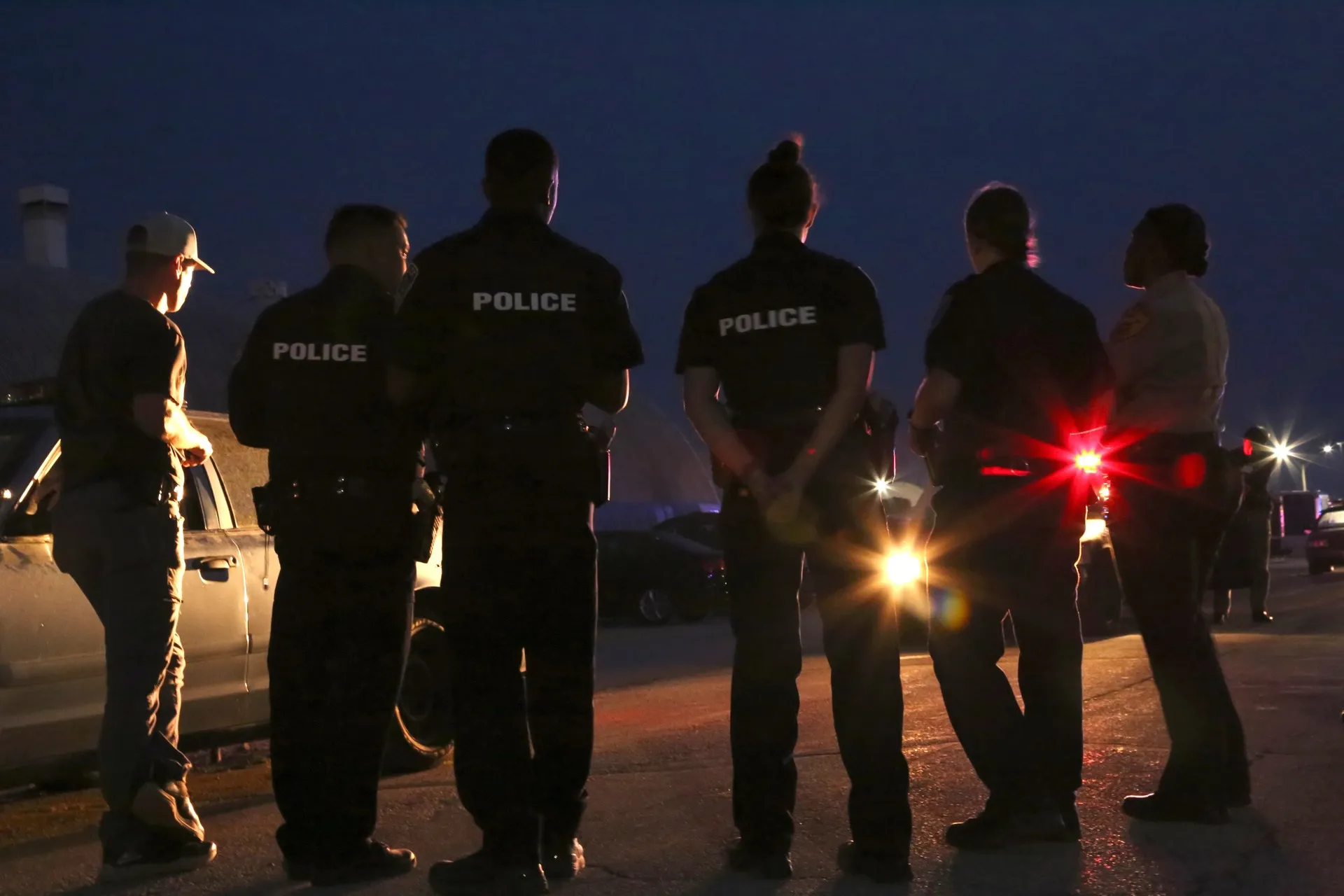 Officers on a nighttime call, the kind of encounter Voysses scenarios rehearse