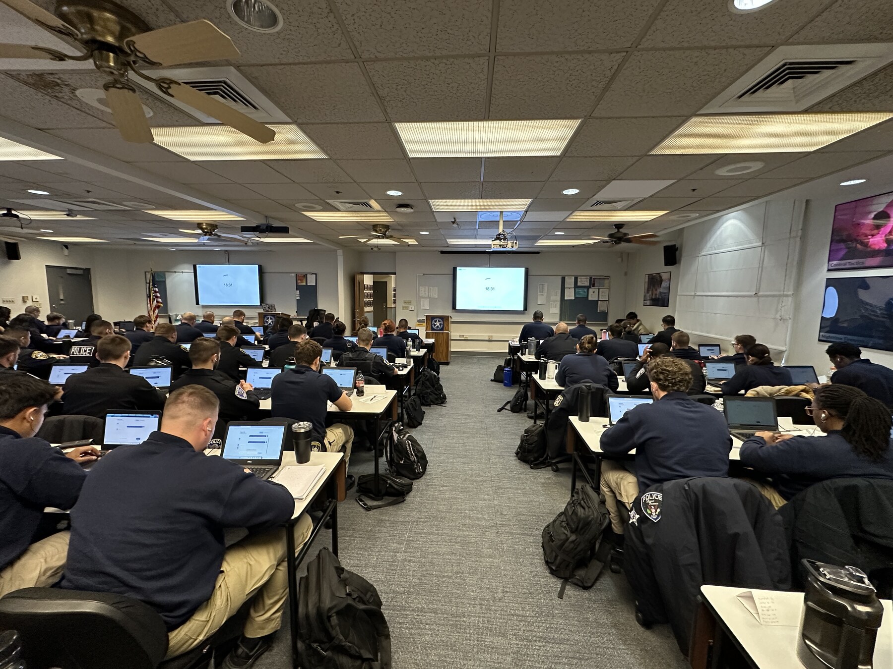 A Police Training Institute recruit cohort practicing with Voysses during class